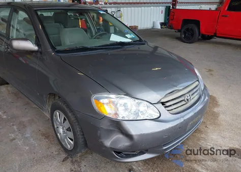 2004 Toyota Corolla Le z USA, uszkodzony, nr VIN 2T1BR32E24C216064